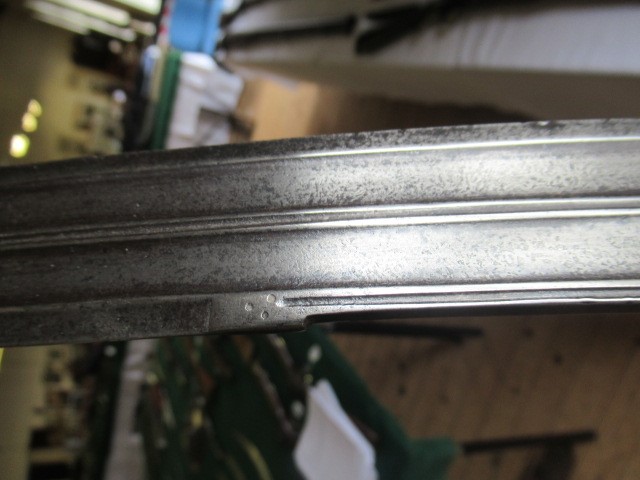 AN INDIAN TALWAR, 19th century, the 29 1/4" curved blade with fine fullers and edge shaping, and Image