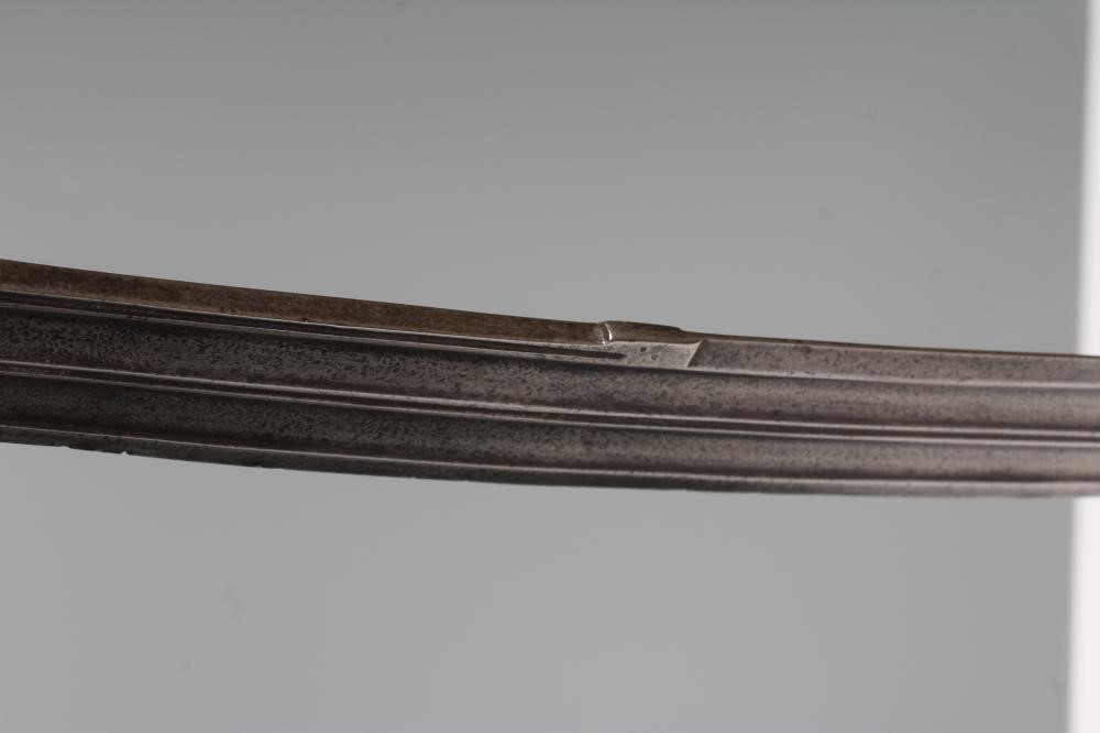 AN INDIAN TALWAR, 19th century, the 29 1/4" curved blade with fine fullers and edge shaping, and Image