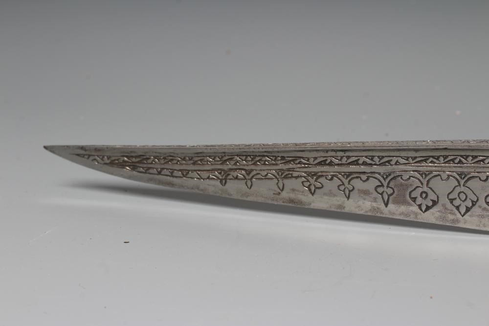 A KHYBER SWORD, late 19th/early 20th century, with 21" deeply etched blade, brass hilt strap and Image
