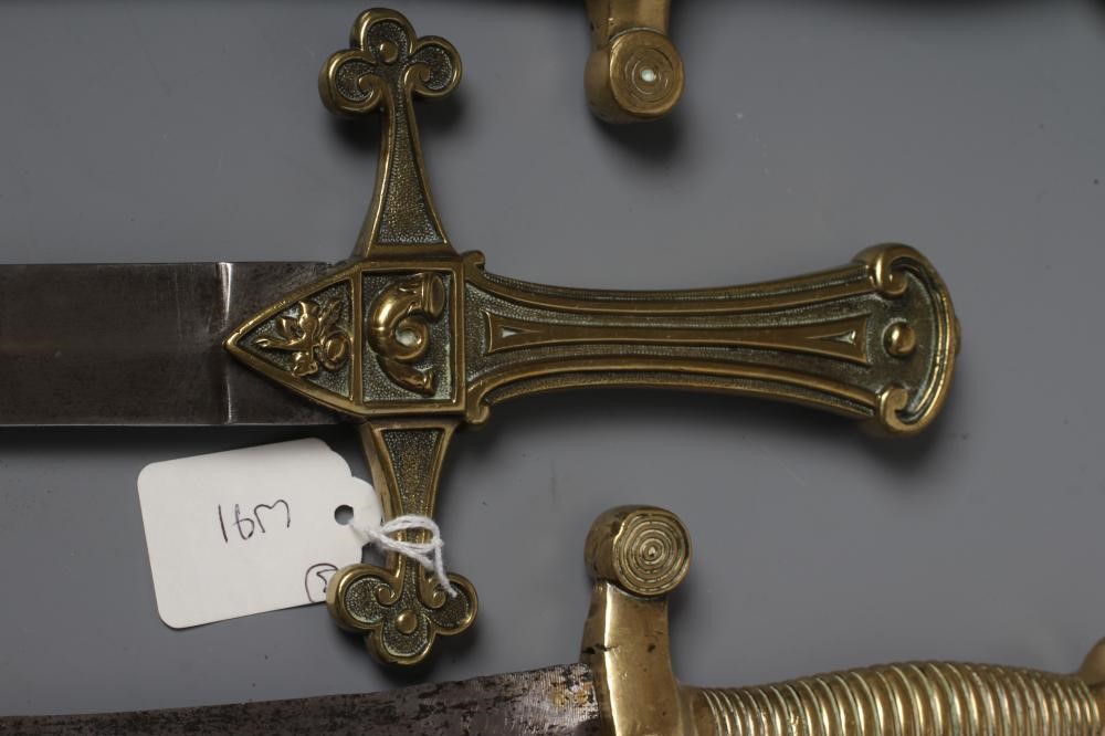 THREE SHORT SWORDS, comprIsing two 1831 pattern French artillery swords and an 1856 pattern British Image