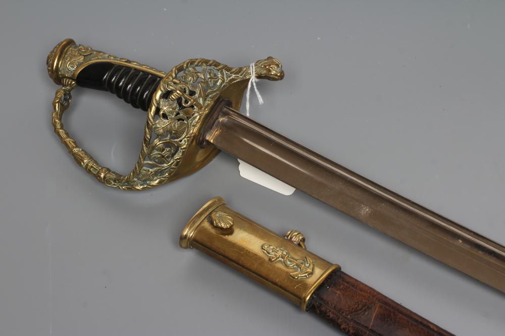 A FRENCH NAVAL OFFICER'S SWORD with 27 1/2" blade, brass hilt with dolphin quillon and anchor amid Image