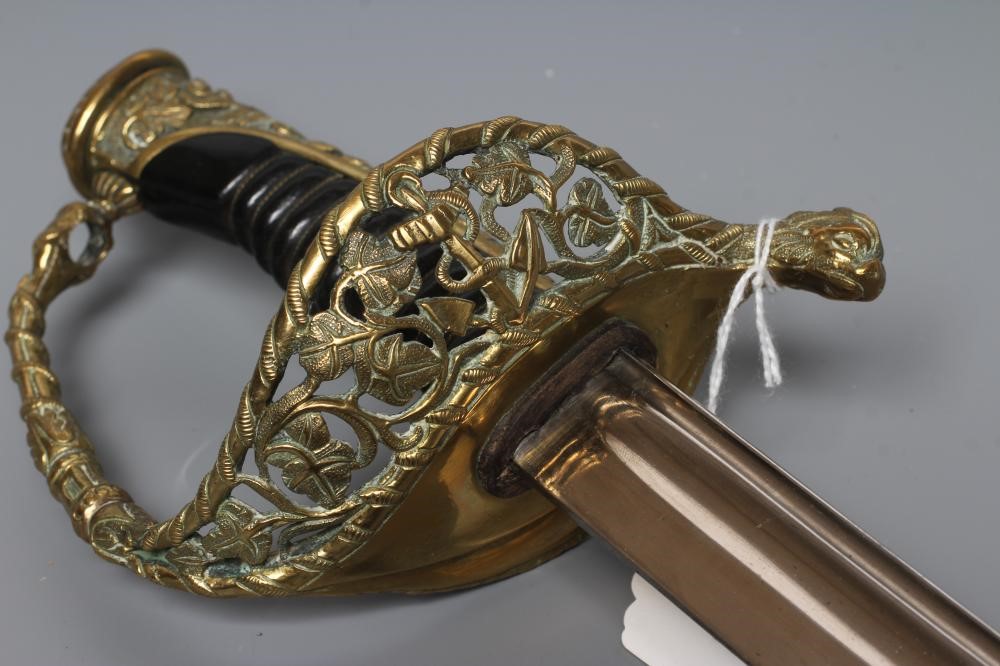 A FRENCH NAVAL OFFICER'S SWORD with 27 1/2" blade, brass hilt with dolphin quillon and anchor amid Image