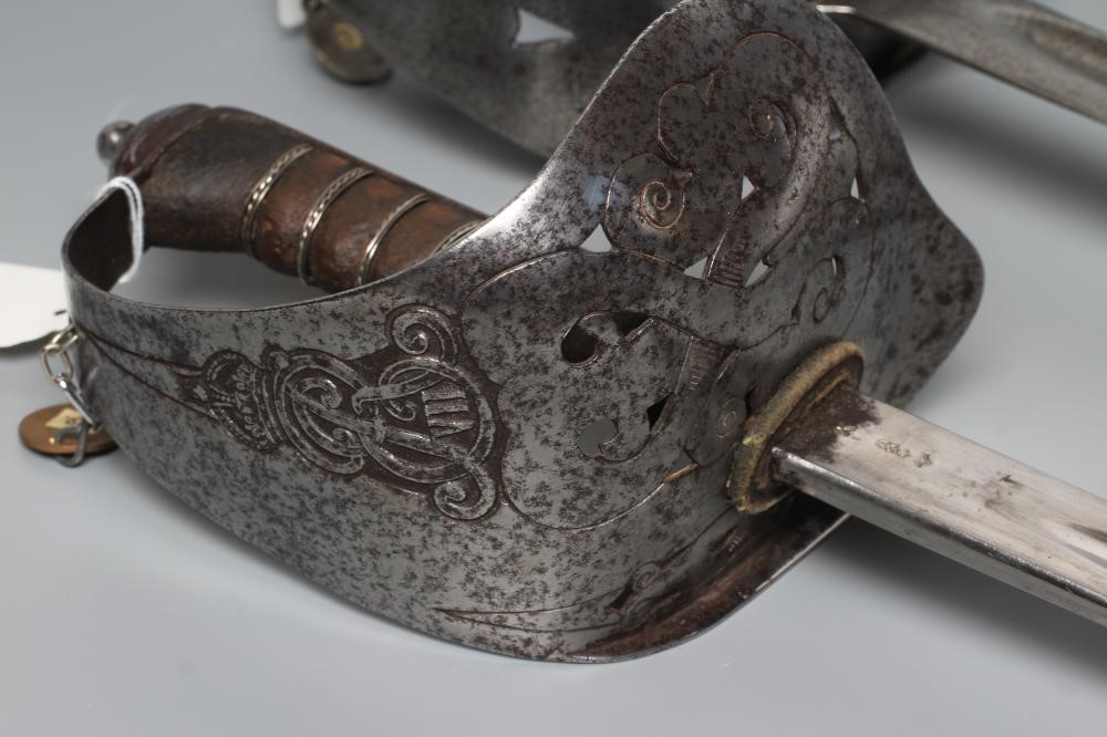 TWO BRITISH MILITARY SWORDS, comprising one 1897 pattern officer's sword with ER VII cypher and an Image