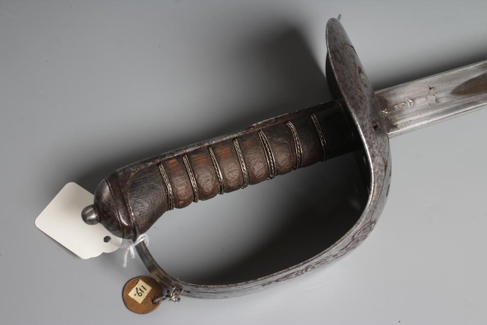 TWO BRITISH MILITARY SWORDS, comprising one 1897 pattern officer's sword with ER VII cypher and an Image