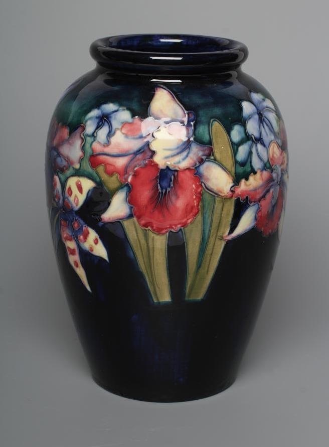 A MOORCROFT POTTERY ORCHID PATTERN VASE Image