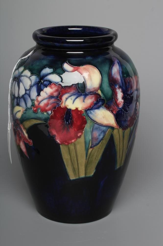 A MOORCROFT POTTERY ORCHID PATTERN VASE Image
