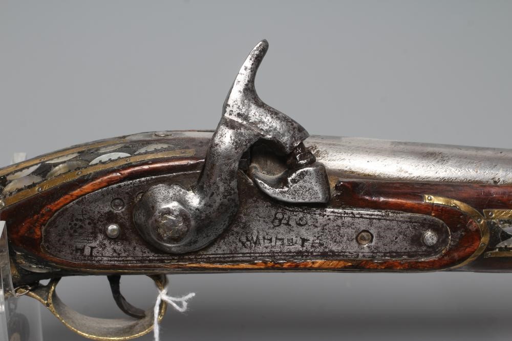 TWO AFGHAN PERCUSSION PISTOLS, one with British style lock and both with decorative stocks including Image