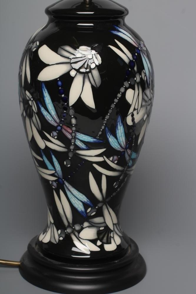 A MOORCROFT POTTERY CLARA PATTERN TABLE LAMP Image