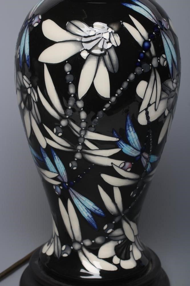 A MOORCROFT POTTERY CLARA PATTERN TABLE LAMP Image