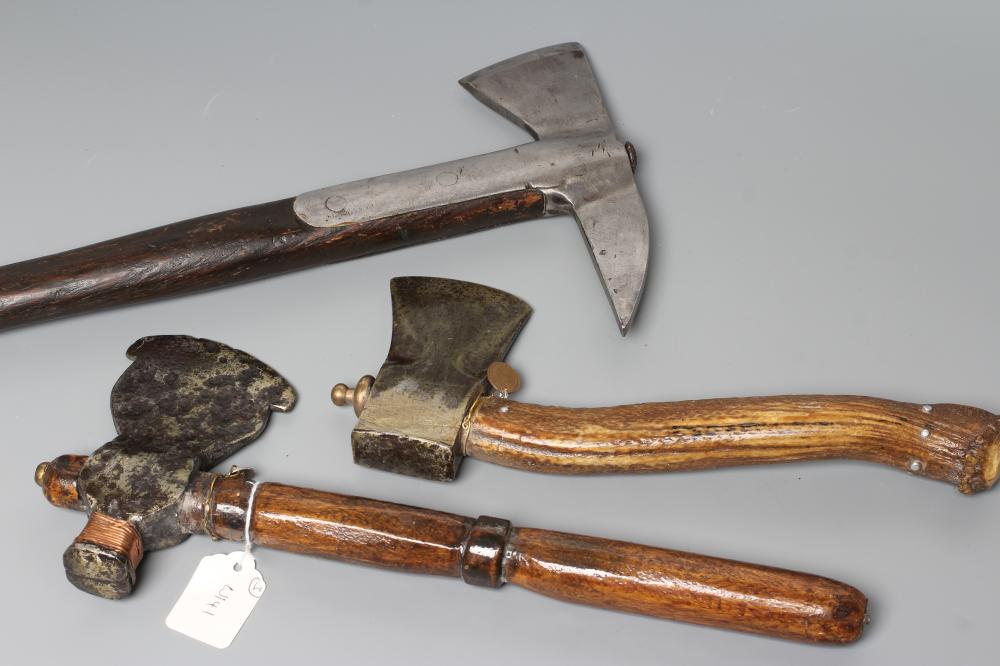 Three british axes, two antique axes, both dug up by the owner and reshafted, together with a