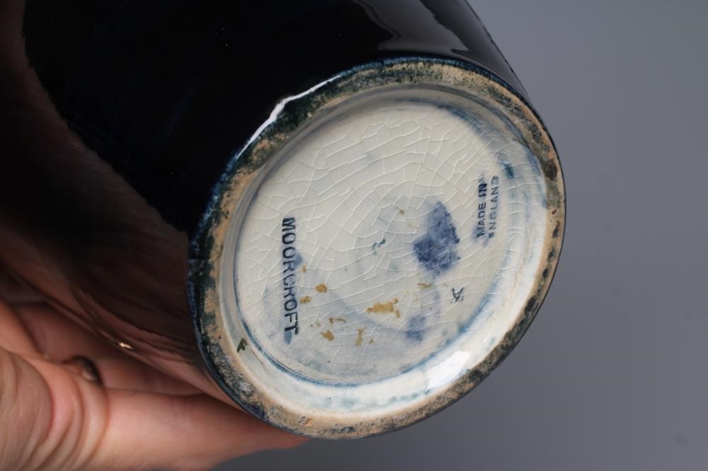 A MOORCROFT POTTERY HIBISCUS PATTERN VASE, mid 20th century, of rounded cylindrical form, tubelined Image