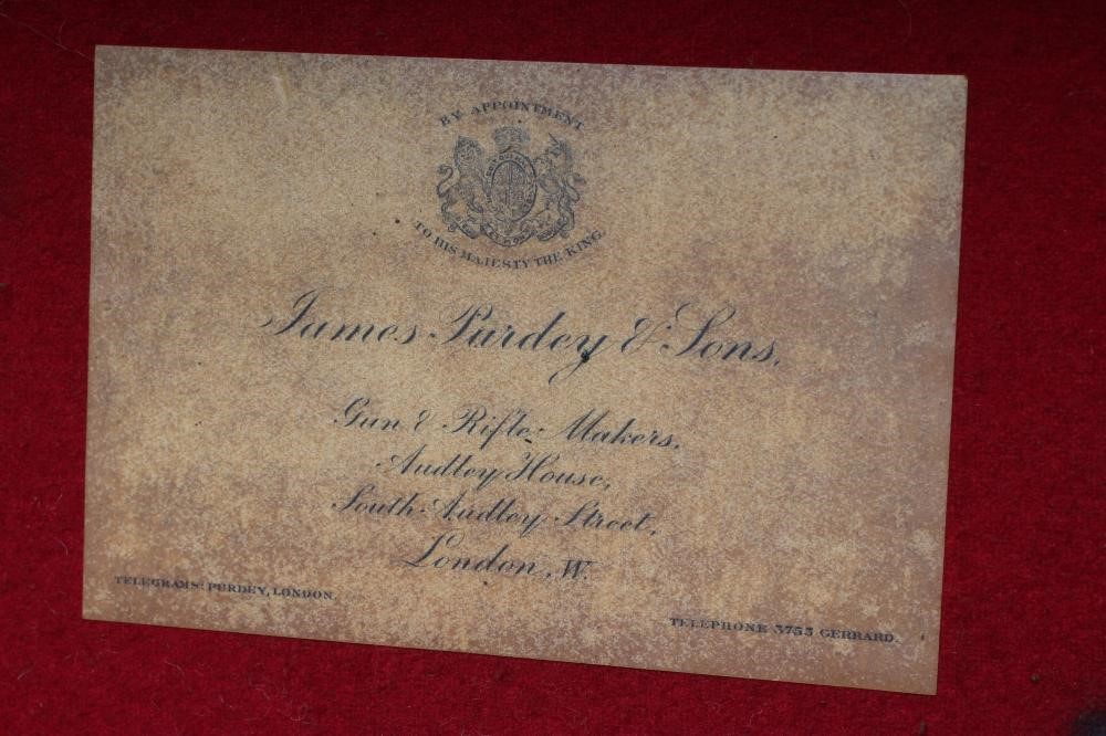 A JAMES PURDEY & SONS DOUBLE SHOTGUN CASE of oak and leather construction Image