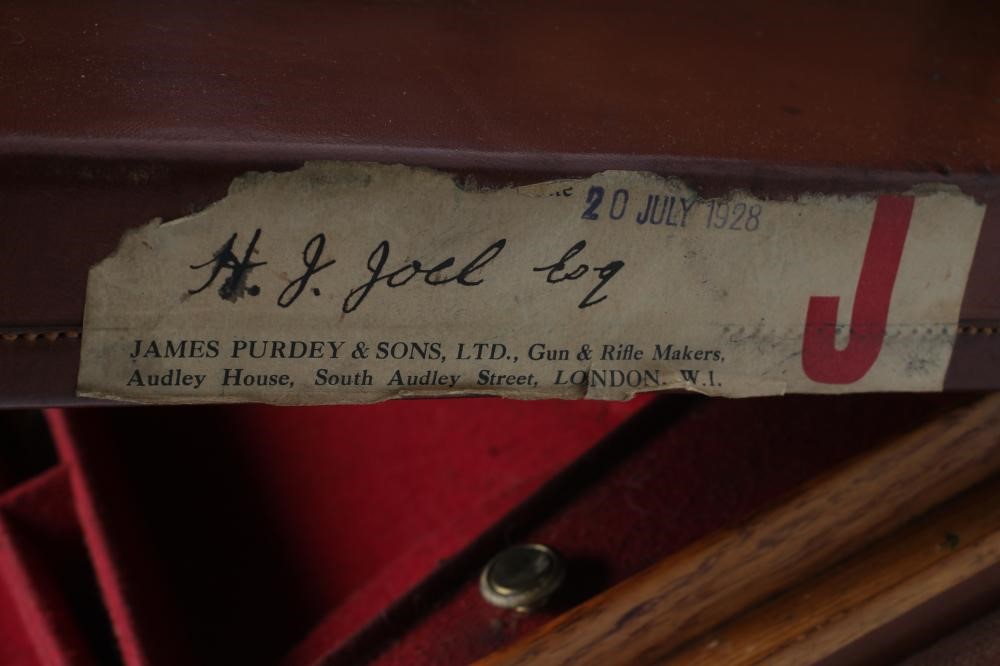 A JAMES PURDEY & SONS DOUBLE SHOTGUN CASE of oak and leather construction Image