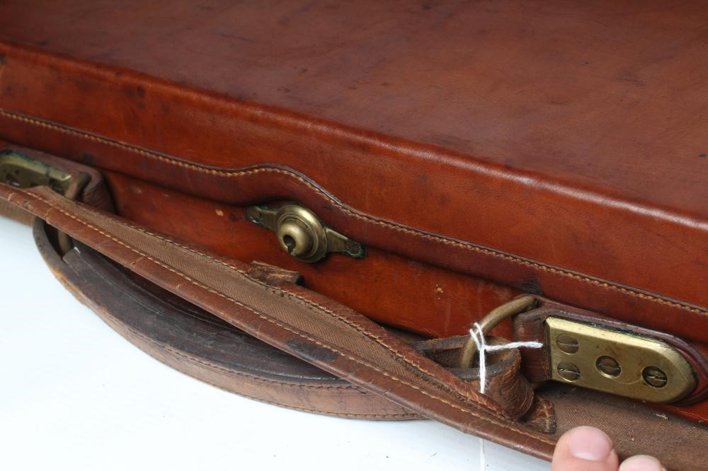 A JAMES PURDEY & SONS DOUBLE SHOTGUN CASE of oak and leather construction Image