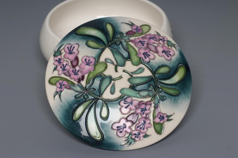 A MOORCROFT POTTERY MEADOW THYME PATTERN BOX AND COVER Image