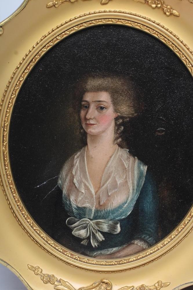 ENGLISH SCHOOL (18th century) Portraits of A Lady and A Gentleman, a pair of oval miniatures, oil on Image