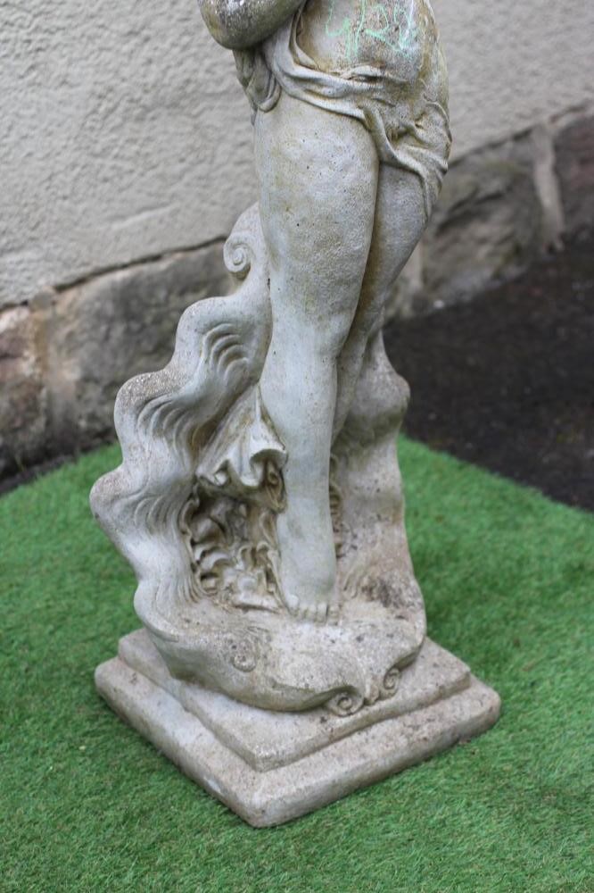 A CAST STONE FIGURE OF VENUS after Botticelli's "The Birth of Venus", on a stepped square base, 12" Image