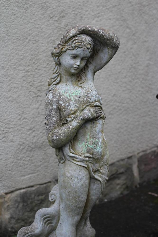 A CAST STONE FIGURE OF VENUS after Botticelli's "The Birth of Venus", on a stepped square base, 12" Image