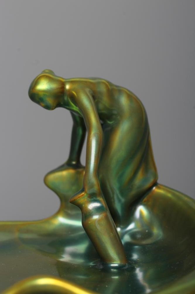 A ZSOLNAY PECS GREEN IRIDESCENT POTTERY FIGURAL DISH Image