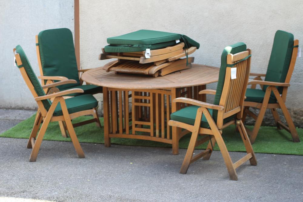AN ARTS & CRAFTS STYLE SLATTED TEAK DINING SUITE Image