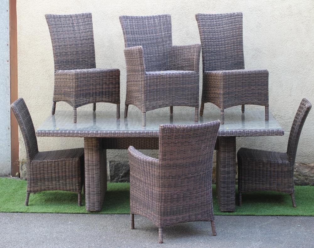 AN ALL WEATHER RESIN WEAVE DINING SUITE Image