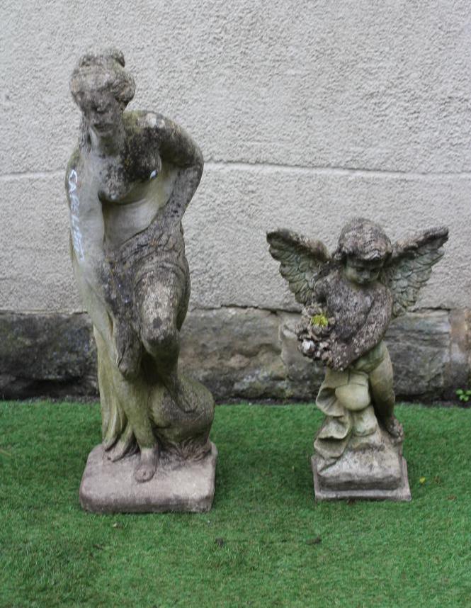 A CAST STONE FIGURE OF VENUS, together with a figure of a winged cherub holding a bouquet, 35 1/2" x Image