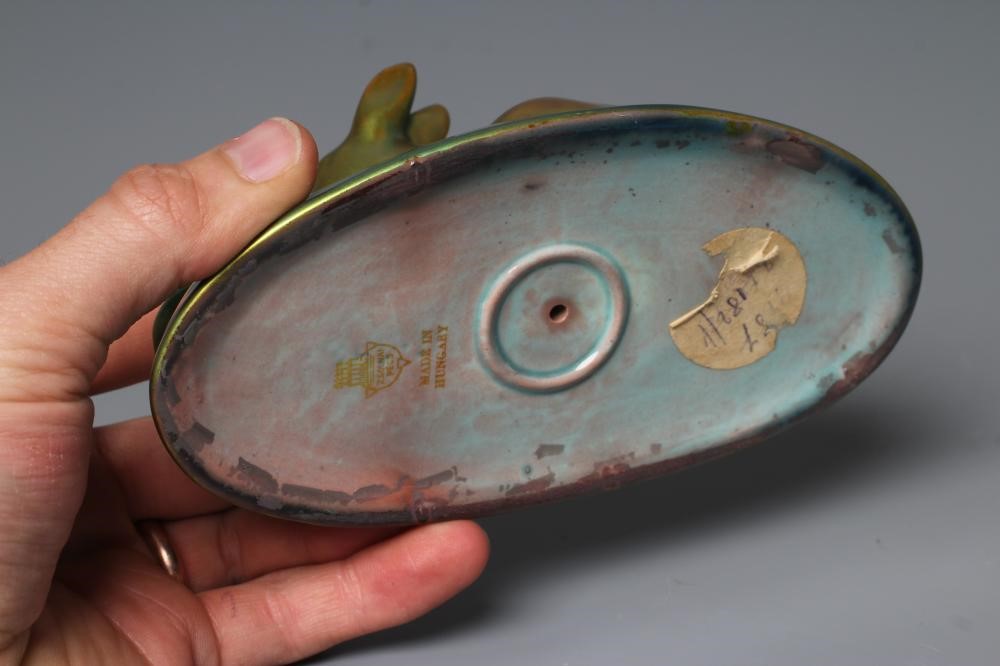 A ZSOLNAY PECS GREEN IRIDESCENT POTTERY MODEL, mid 20th century, of two recumbent deer, printed gilt Image