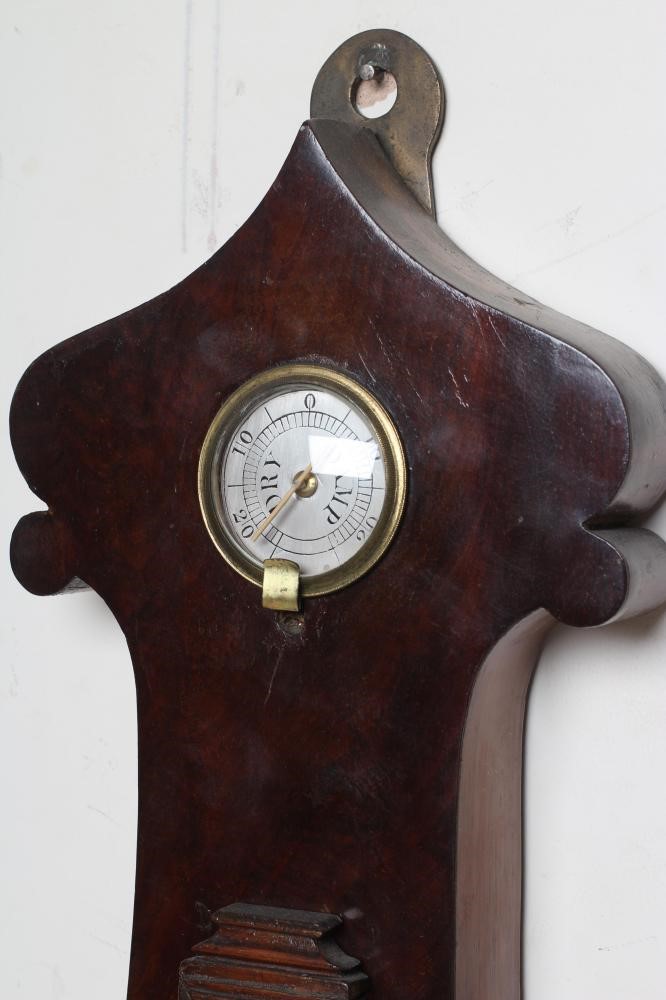 A LARGE MAHOGANY WHEEL BAROMETER Image