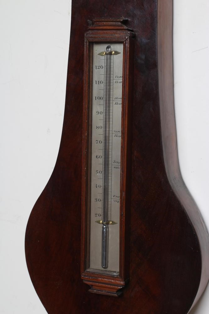 A LARGE MAHOGANY WHEEL BAROMETER Image