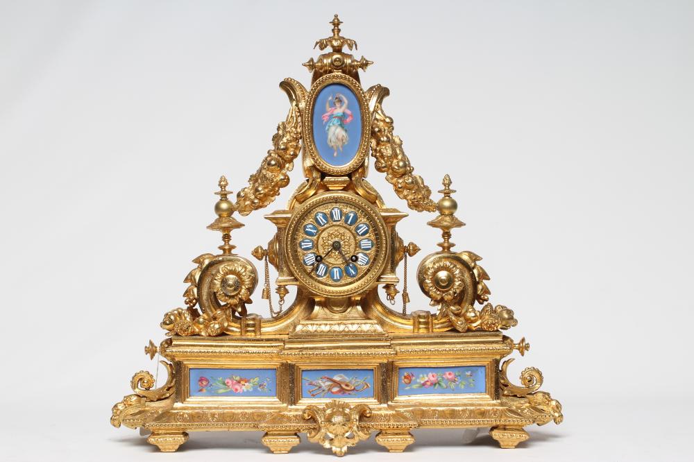 A LOUIS XVI STYLE GILT METAL MANTEL CLOCK Image