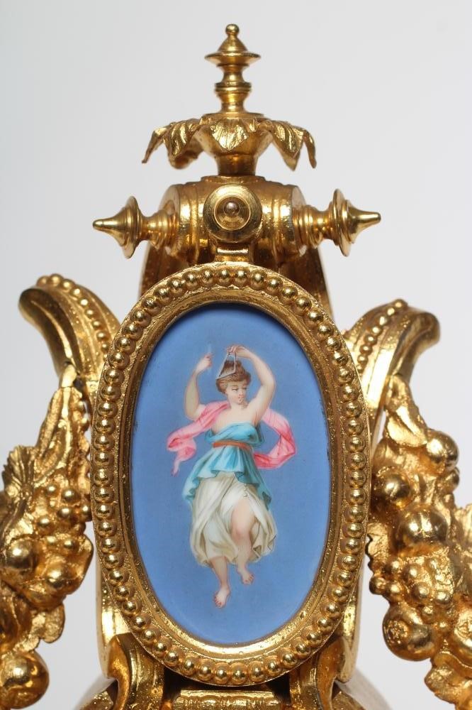 A LOUIS XVI STYLE GILT METAL MANTEL CLOCK Image