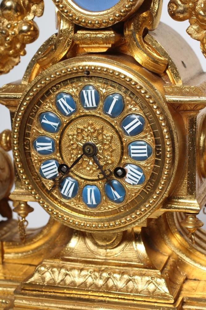 A LOUIS XVI STYLE GILT METAL MANTEL CLOCK Image