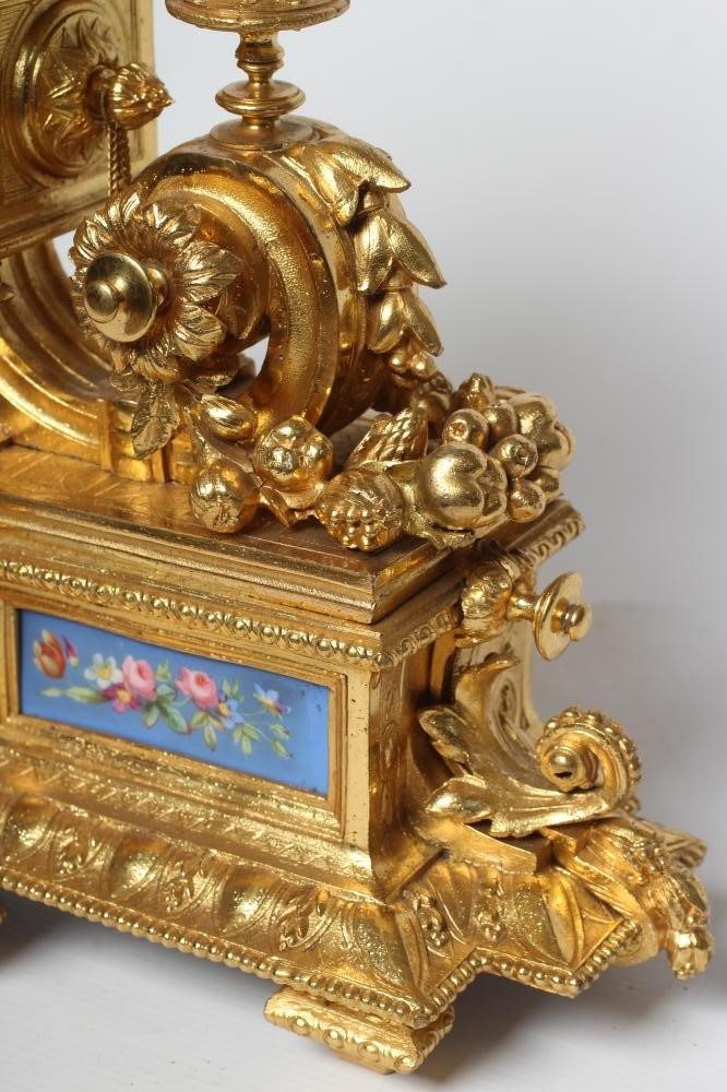 A LOUIS XVI STYLE GILT METAL MANTEL CLOCK Image