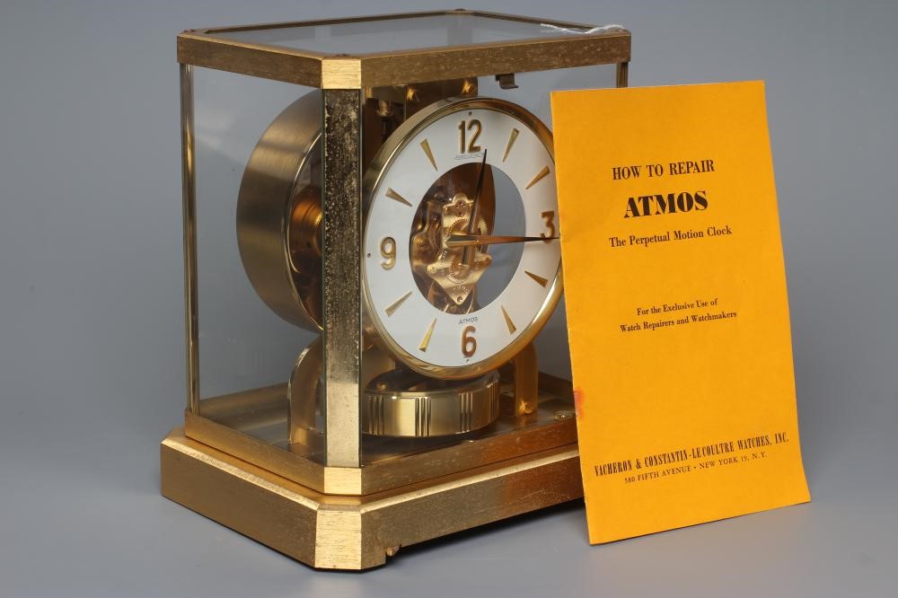 A JAEGER LECOULTRE ATMOS CLOCK, No 217094, the 4 3/4" white enamelled chapter ring with gilt Arabic Image