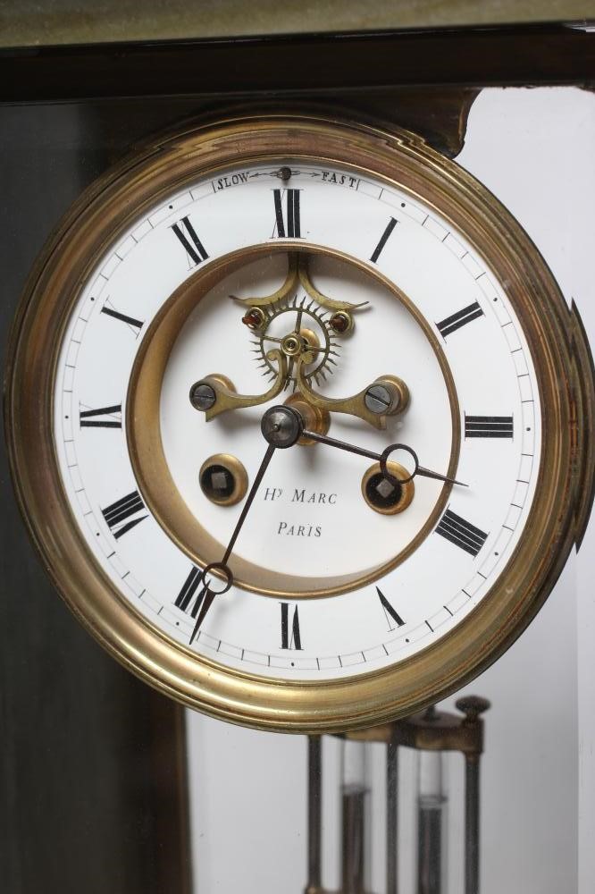 A FRENCH MARBLE MANTEL CLOCK Image