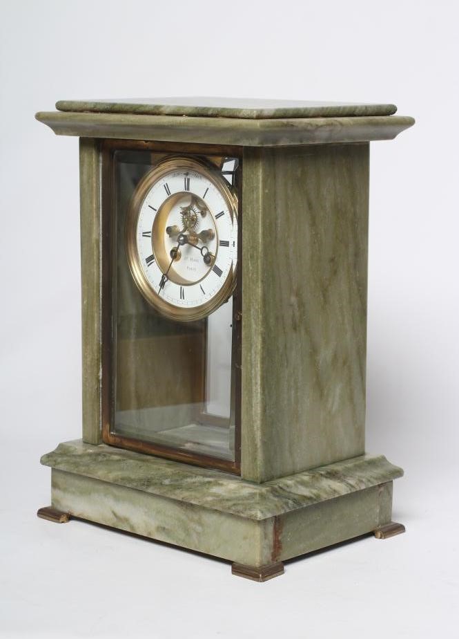 A FRENCH MARBLE MANTEL CLOCK Image