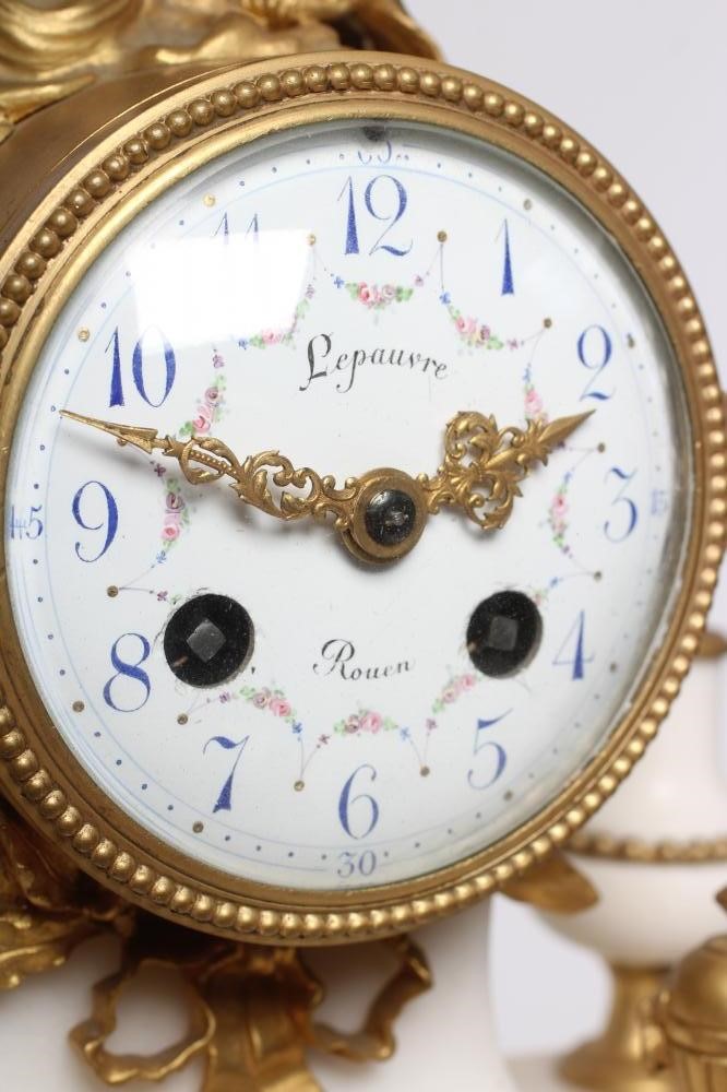 A GILT METAL AND WHITE MARBLE PORTICO CLOCK Image