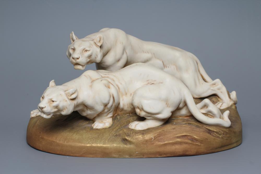 A ROYAL DUX BISQUE PORCELAIN MODEL OF TWO LIONESSES Image