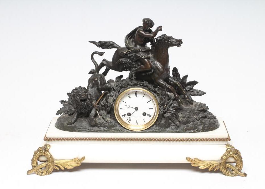 A FRENCH SPELTER AND WHITE MARBLE MANTEL CLOCK Image