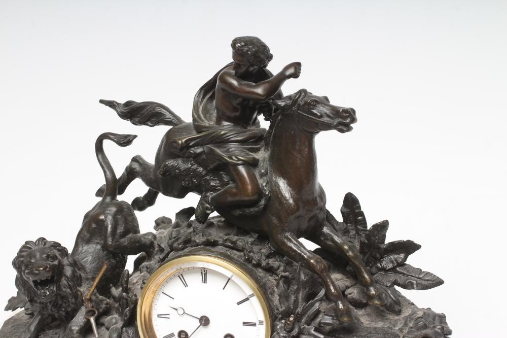 A FRENCH SPELTER AND WHITE MARBLE MANTEL CLOCK Image