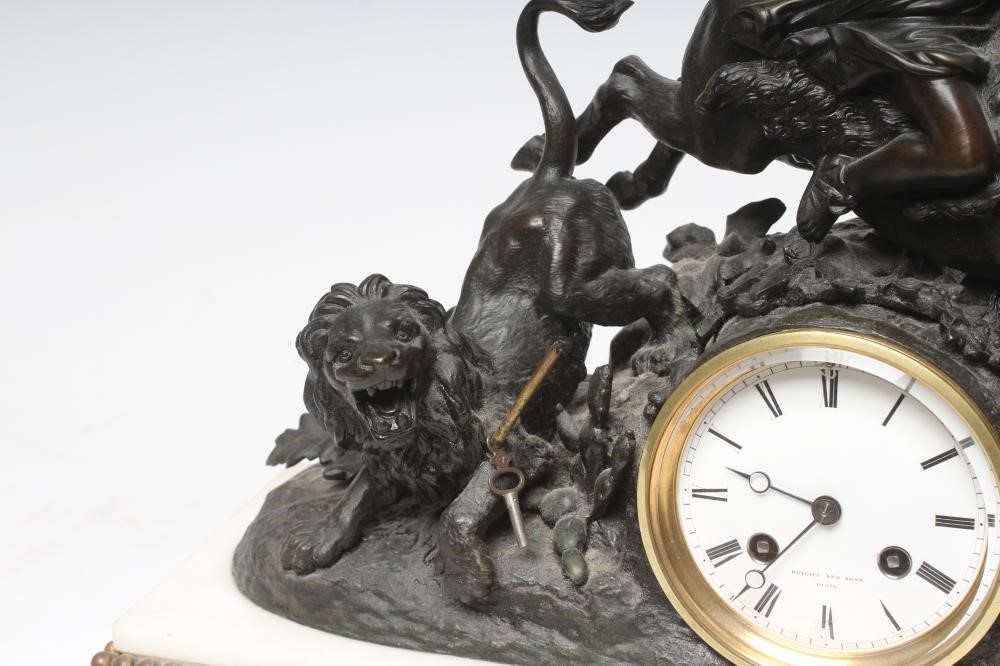 A FRENCH SPELTER AND WHITE MARBLE MANTEL CLOCK Image