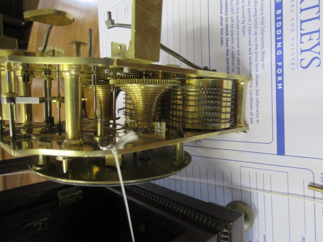 A REGENCY ROSEWOOD MANTEL CLOCK Image