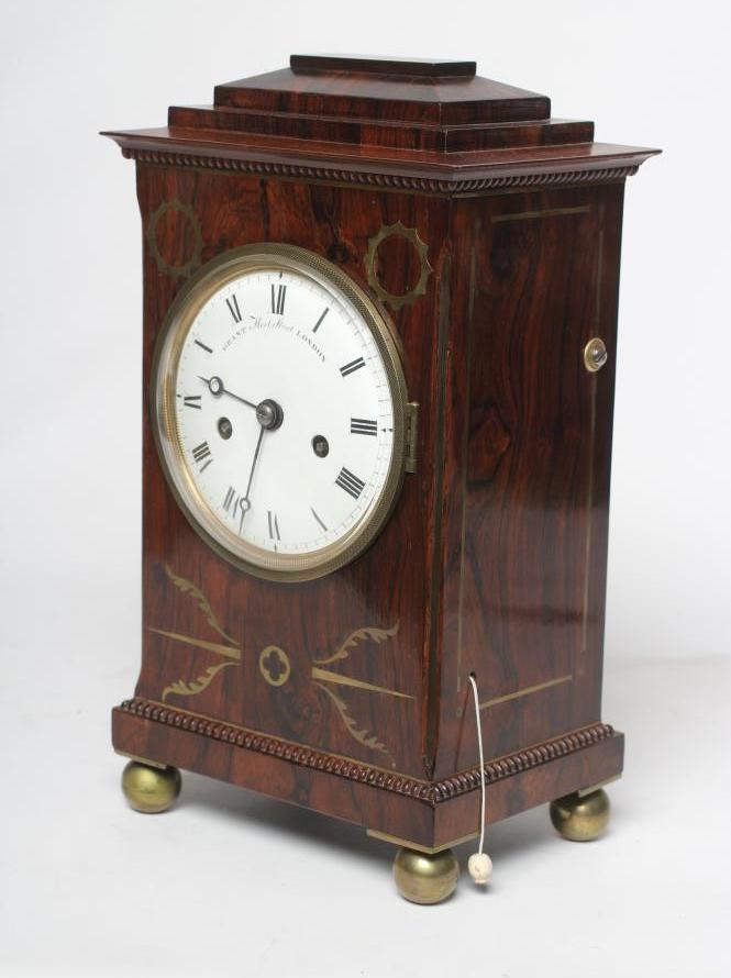 A REGENCY ROSEWOOD MANTEL CLOCK Image