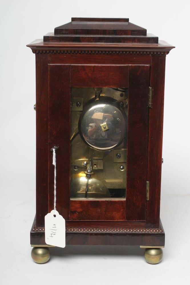 A REGENCY ROSEWOOD MANTEL CLOCK Image