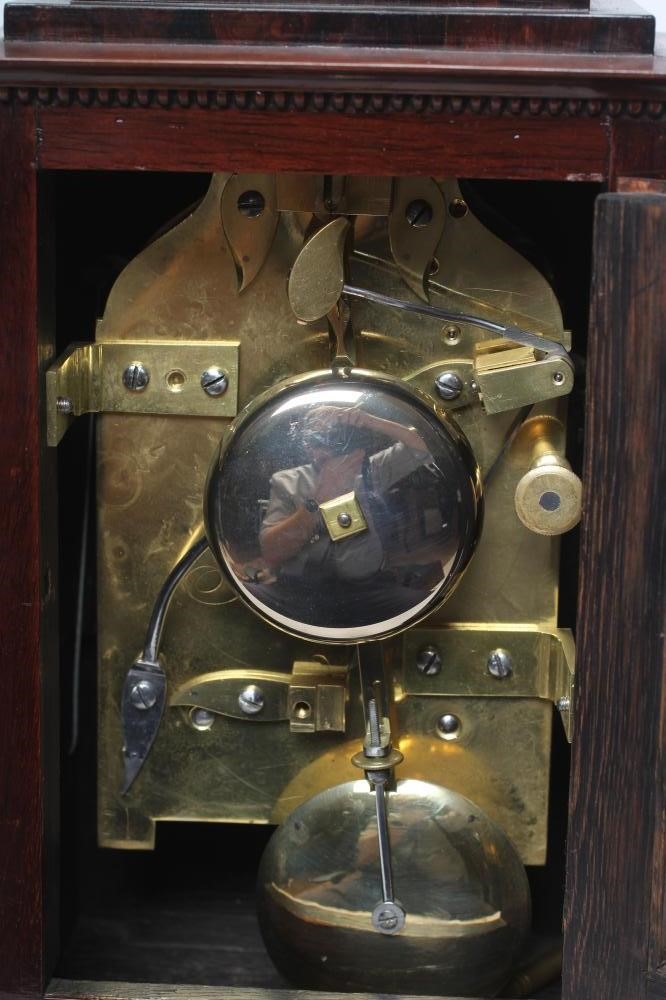 A REGENCY ROSEWOOD MANTEL CLOCK Image