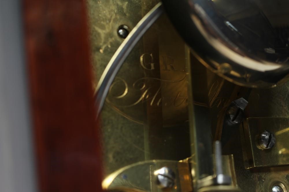 A REGENCY ROSEWOOD MANTEL CLOCK Image