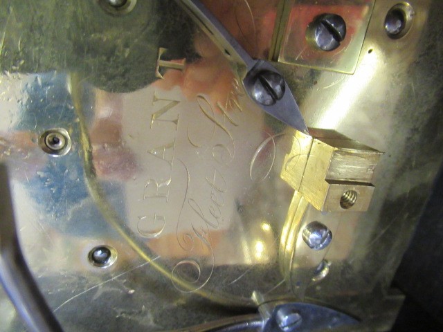 A REGENCY ROSEWOOD MANTEL CLOCK Image