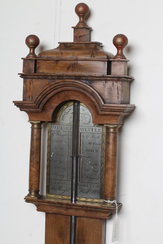 A BURR WALNUT STICK BAROMETER Image