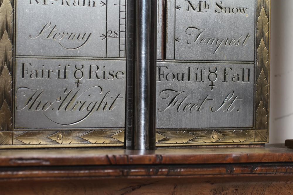 A BURR WALNUT STICK BAROMETER Image