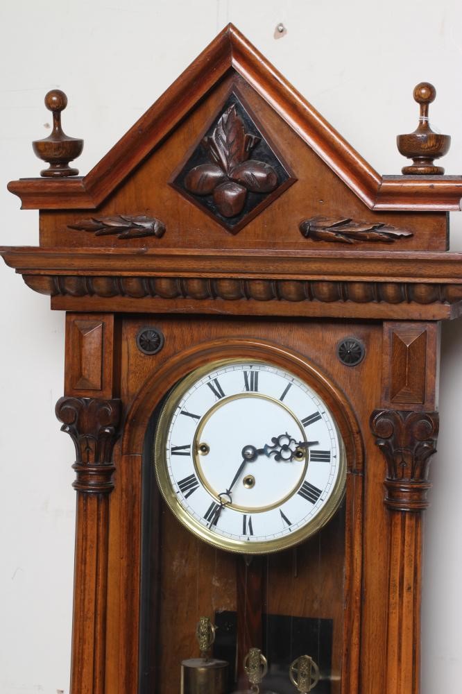 A WALNUT VIENNA TYPE WALL CLOCK Image